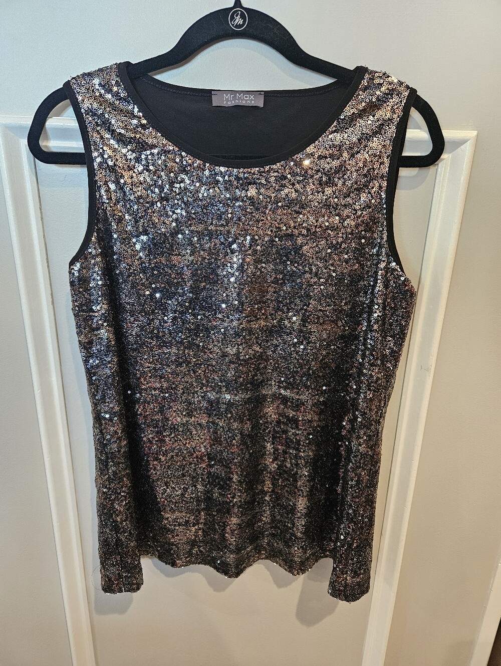 Mr Max Fashion gold and black sequined top with black trim. Size medium.
